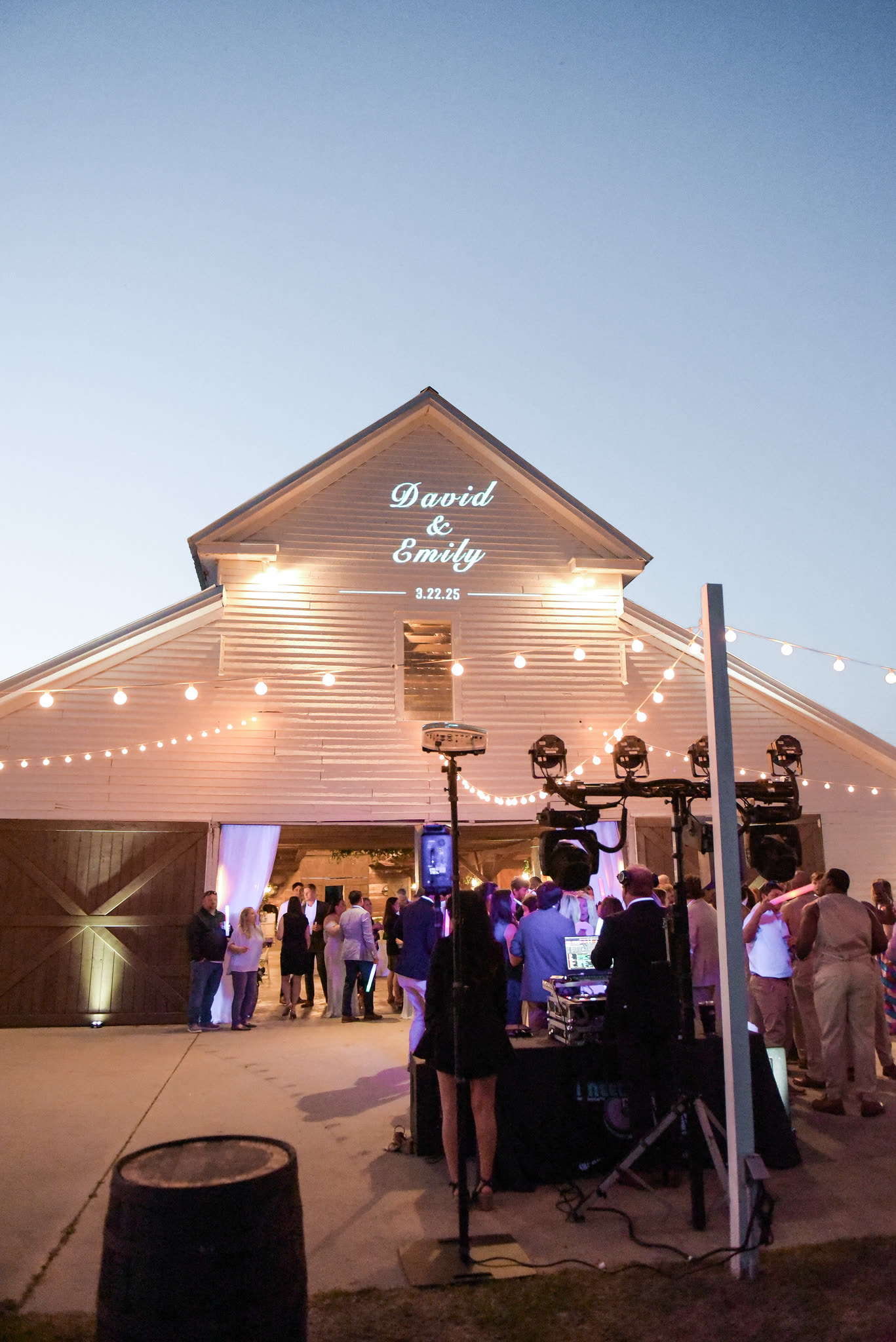 Monogram lighting outside a barn venue